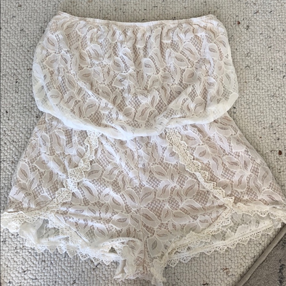 Off white lace Free People romper. Size small